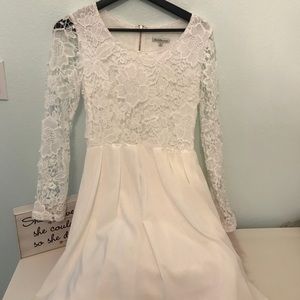 White lone sleeve dress with lace detailing